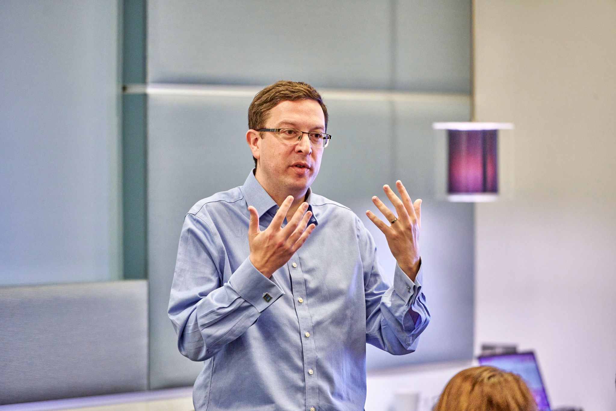 Neill Harvey-Smith mid-conversation, gesturing